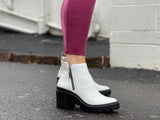 Carrano Cece ankle boots, European made of quality high shine leather Zipper, robust rubberized tractor sole. Grungy from Brazil. Goth platforms in white.