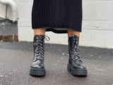 Quality European footwear. Women's boots made in Brazil, leather combat style boot in black.