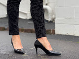Comfortable, quality European women's stiletto sandal in patent leather. Wedding or special occasion shoe in black.