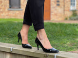 Comfortable, quality European women's stiletto sandal in patent leather. Wedding or special occasion shoe in black.