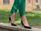 Comfortable, quality European women's stiletto sandal in patent leather. Wedding or special occasion shoe in black.