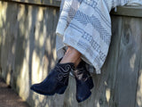 European ankle boots hand made in Portugal, embroidered design on the ankle, along with ribbed leather detail. Western style bootie in gray