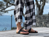 Quality European women's sandals. Made in Spain contoured cork footbed and rubber sole. Thong style sandal that comes in black.