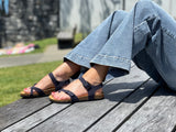 Quality European women's sandals. Made in Spain contoured cork footbed and rubber sole. Slide style sandal with toe ring that comes in blue.