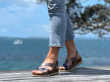 Quality European women's sandals. Made in Spain contoured cork footbed and rubber sole. Strappy sandal that comes in graphite navy.
