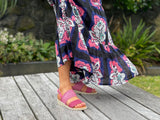 Comfortable women's slingback  sandals. European made in Spain. Soft quality leather straps with elastication and wedge rubber sole unit. In fuschia.