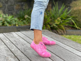 European sustainable women's fashion sneakers. Sole made from recycled plastic. Made in Spain in pink colour.