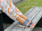 Comfortable women's slingback  sandals. European made in Spain. Soft quality leather straps with elastication and wedge rubber sole unit. In navy.