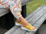 Comfortable women's slide  sandals. European from Spain. Soft quality leather straps and wedge sole unit. In  yellow.