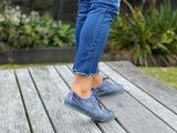 European sustainable women's fashion sneakers. Sole made from recycled plastic. Made in Spain in denim colour.