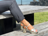 Comfortable, quality European women's sandals. Chunky block heel with soft square toe. Special occasion or dress sandal in gold.