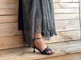 Comfortable, quality European women's sandals. Marian Becks sandals with a small kitten heel, featuring plaited chain-link detailing across the toe bar. Wedding or special occasion shoe in black.