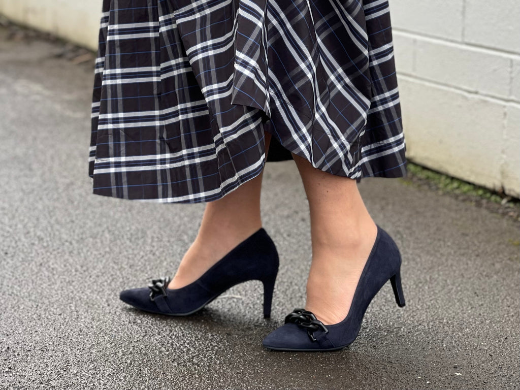 Comfortable, quality European women's stiletto sandal in suede leather. Quirky chain link detailing across the toe bar. Wedding or special occasion shoe in navy.
