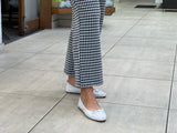 European women's sandals. Ballet flat with woven detail on toe. Quality soft leather uppers in white.