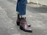 Burgundy western style ankle boots with a high shine, textured leather finish, zipper entry. Robust rubberized sole. European handmade in Portugal with quality leathers beautiful women's boots.