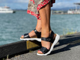 Comfortable European women's sandals.  Made in Portugal with anatomic cork footbed offering full support, fully adjustable with Velcro straps/fastening. In black.