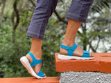 Comfortable European women's sandals.  Made in Portugal with anatomic cork footbed offering full support, fully adjustable with Velcro straps/fastening. In turquoise.