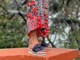 Aerobics are quality European women's sandals and slides. Soft leather with bow detail in navy.
