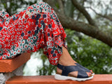 Comfortable European women's sandals. Contoured cork footbed. Soft quality leather, cross over straps with Velcro strap in navy. Travel sandal sport inspired sole.