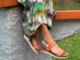 Comfortable European sport inspired sandals made with quality leather. Cork footbed on wedge sole unit. Fabulous women's shoes/sandals in tangerine.