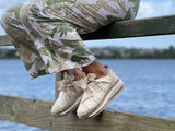 Quality European women's shoes. Made is Spain comfortable sport luxe fashion sneakers. Espadrille detail in beige.