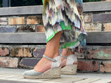 Quality Spanish espadrille sandals made from sage green coloured suede leather. Comfortable, wedge jute sole unit. Enclosed ankle strap and enclosed toe.