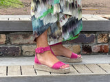 Flat Spanish espadrille sandal. Quality women's sandals and shoes made from suede leather in fuchsia fushia fuxia. Buckle ankle strap, jute sole unit.