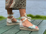 Comfortable, Spanish leather espadrille sandals with enclosed toe. Lace up pattern is sage green colour. Quality European women's footwear and shoes.