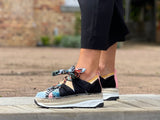 Quality European made women's shoes. Luxe sport sneaker style made in Spain. Comfortable shoe with espadrille detail. In Black multi.