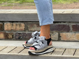 Quality European made women's shoes. Sandal/sneaker style made in Spain. Comfortable shoe with espadrille detail. In Black.