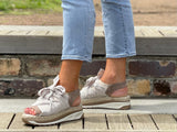 Quality European made women's shoes. Sandal/sneaker style made in Spain. Comfortable shoe with espadrille detail. In Beige.