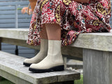European ankle boots hand made in Portugal from quality leather. Off white/beige pull-on combat boots with a high shine leather. Elasticated gussets. Comfortable women's boots with chunky robust sole unit.