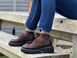 Brown brogue boots with a chunky sole and lace-up front. Quality European shoes from Portugal. Leather uppers, robust tractor sole. Beautiful women's shoes.
