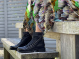European women's ankle boots made in Portugal.  Quality leather uppers, reptile finish. Stacked low heel, with zipper.