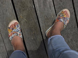 Aerobics are quality European women's sandals and slides. Soft leather with crossover detail in camel. Espadrille detail around the sole unit.