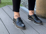 Smart casual, androgynous European man shoe. brogue. Soft Leather uppers comfortable women's shoe.