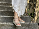 Quality European women's sandals. Made in Spain, soft leather sandals with flexible footbed. Wedge sandals in sand.
