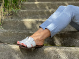 Classic European slide with fringe detail. Made in Spain from quality leathers, comfortable women's sandals/slides. In off white.
