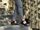 Quality European women's sandals. Made in Spain from soft patent leather. Comfortable wedge sandals in black.