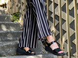 Quality European women's sandals. Made in Spain from soft patent leather. Comfortable wedge sandals in black.