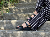 Quality European women's sandals. Made in Spain from soft patent leather. Comfortable wedge sandals in black.